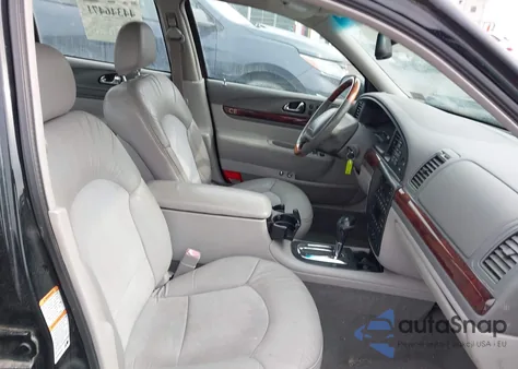 2002 Lincoln Continental z USA, uszkodzony, nr VIN 1LNHM97V22Y677113